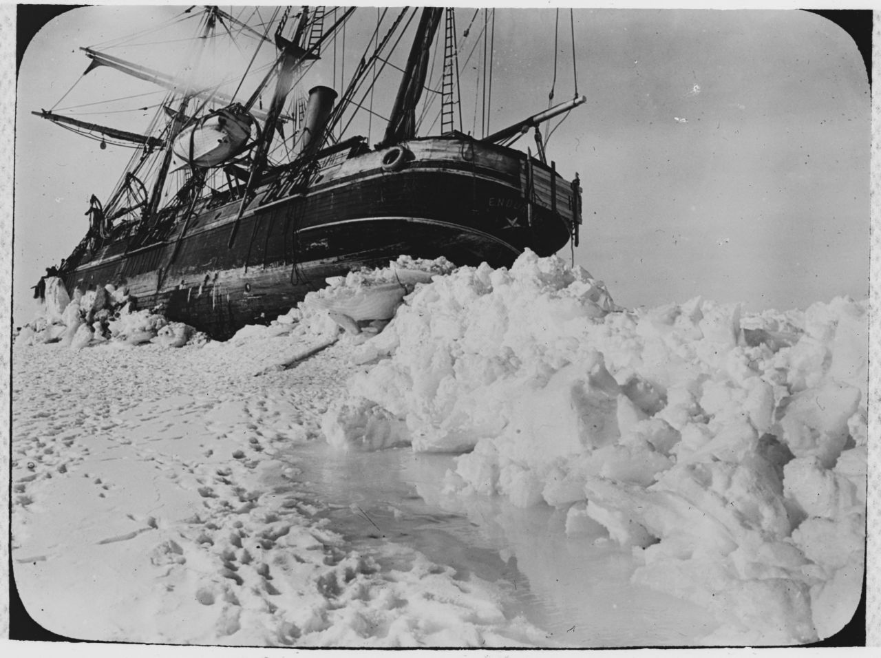 At some point the pressure of the ice pushed the boat over and it began to take on water.