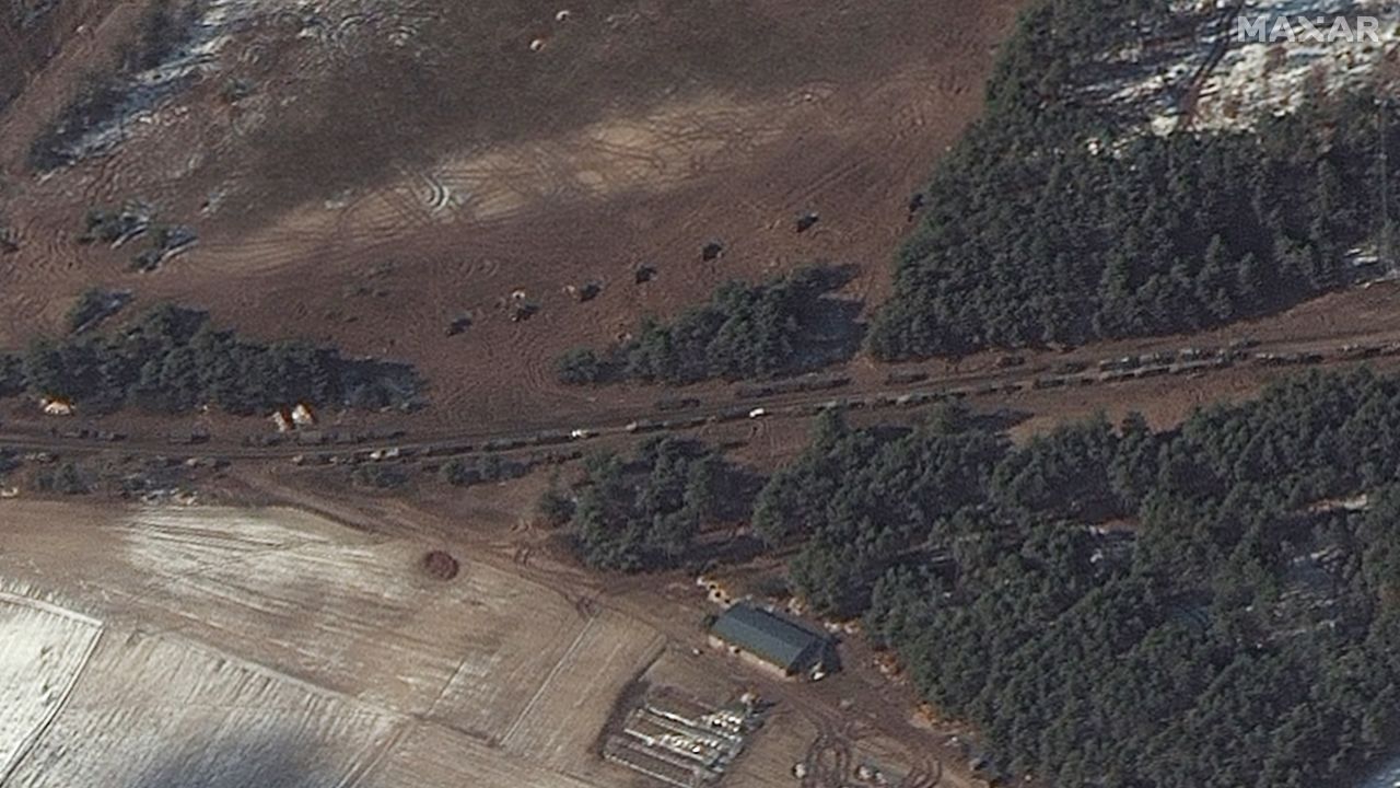 A satellite image taken near Berestyanka, northwest of Kyiv, appears to show resupply trucks and a probable multiple rocket launch deployment, according to Maxar Technologies.