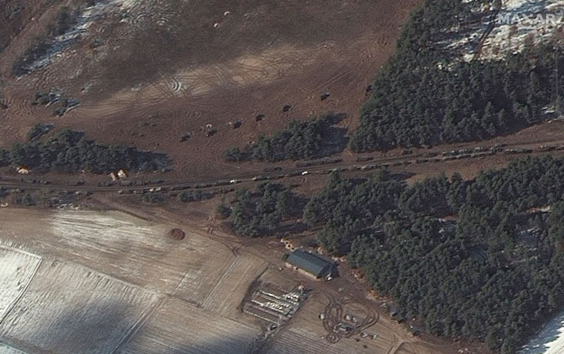A satellite image taken near Berestyanka, northwest of Kyiv, appears to show resupply trucks and a probable multiple rocket launch deployment, according to Maxar Technologies.