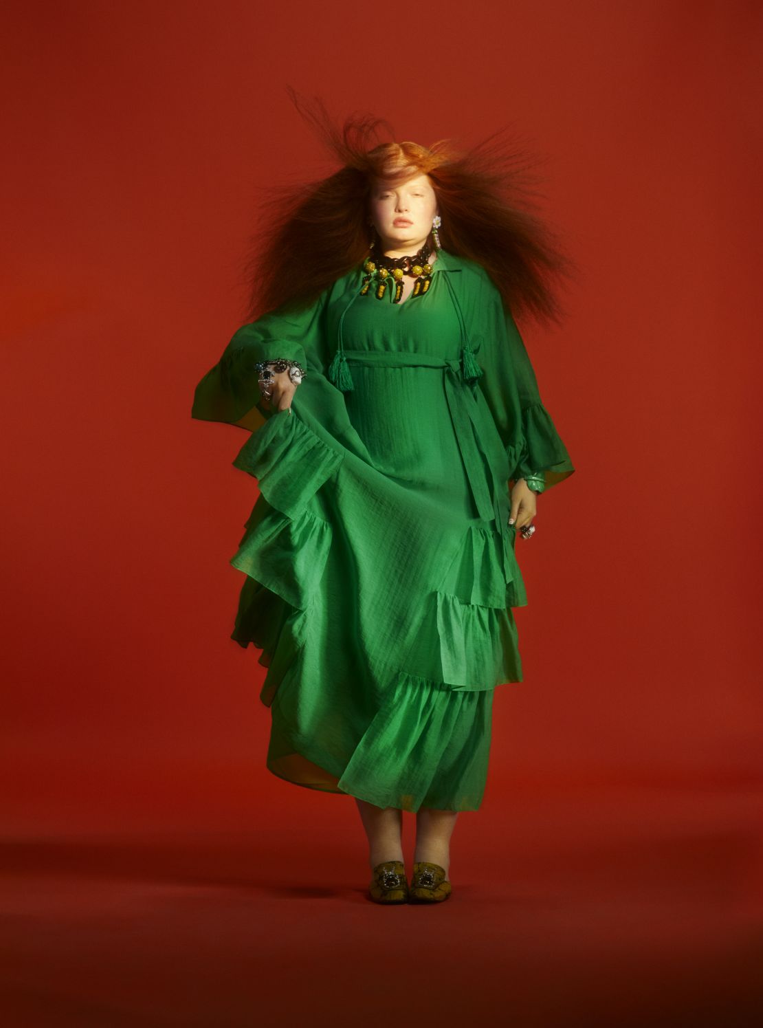 This green tiered kaftan is a highlight of the collection.