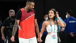MELBOURNE, AUSTRALIA - JANUARY 29: Nick Kyrgios of Australia walks with his girlfriend Costeen Hatzi after winning his Men's Doubles Final match with Thanasi Kokkinakis of Australia against Matthew Ebden of Australia and Max Purcell of Australia during day 13 of the 2022 Australian Open at Melbourne Park on January 29, 2022 in Melbourne, Australia. (Photo by Quinn Rooney/Getty Images)