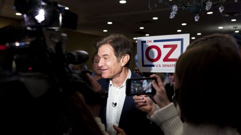 Dr. Mehmet Oz, celebrity physician and Republican US Senate candidate in Pennsylvania, speaks to members of the media following a campaign event at a restaurant in Greensburg, Pennsylvania, on January 26, 2022. 