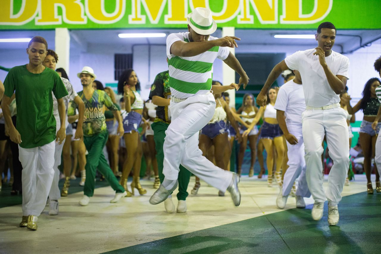 Jairo Cruz, a dancer and member of the Imperatriz Leopoldinense samba school, participates in a community rehearsal at the school's headquarters in Ramos, Brazil, in November 2021. Expectations are high for Rio de Janeiro's samba schools for Carnival 2022 after the 2021 parade was cancelled due to Covid-19.