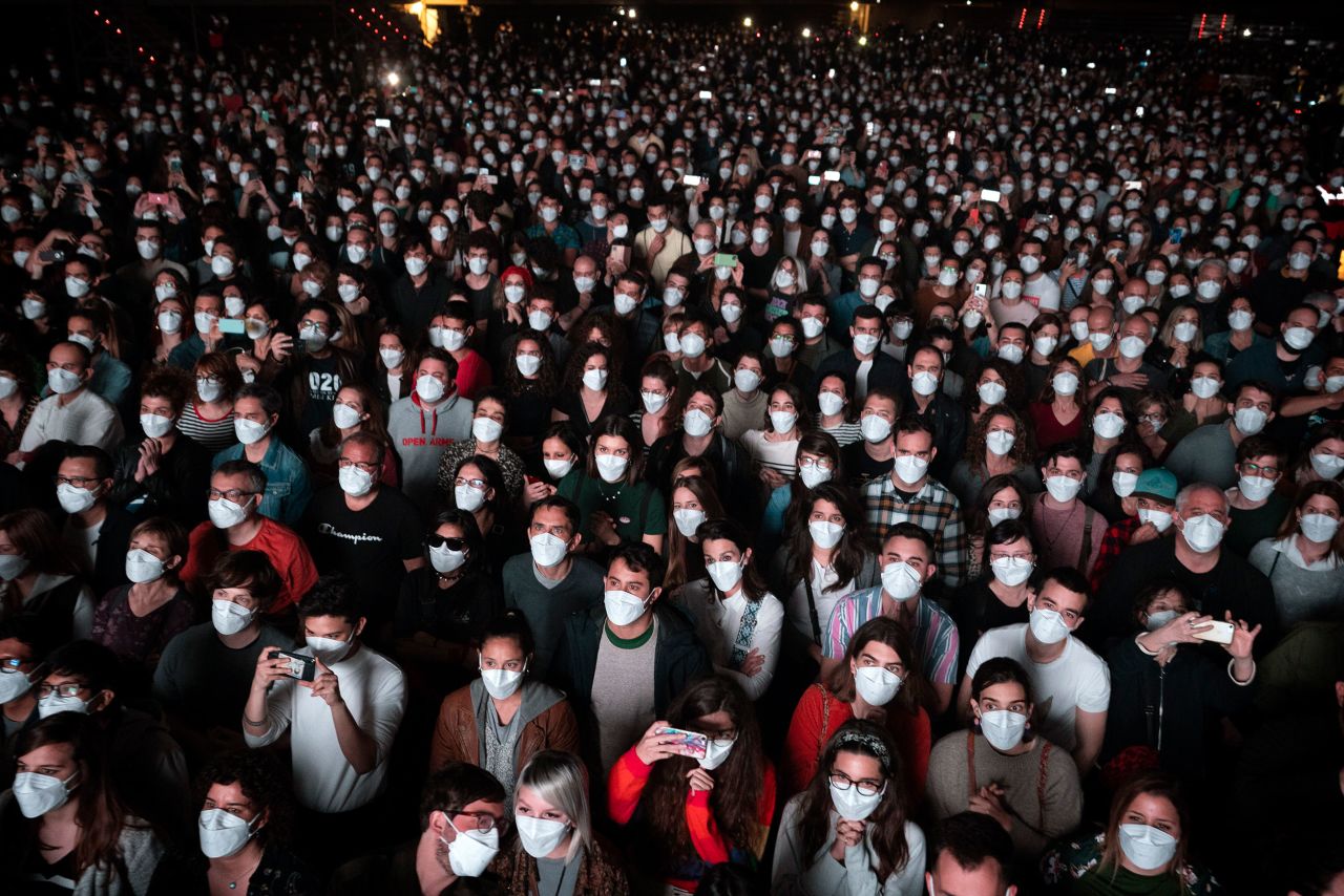 People in Barcelona, Spain, attend a concert for the rock group Love of Lesbian in March 2021. Fans had to take a same-day Covid-19 test before attending the show, which was permitted by Spanish health authorities.
