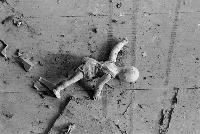 A doll remains in an evacuated village in Belarus near Chernobyl. Millions of people were exposed to dangerous radiation levels, and <a href="index.php?page=&url=https%3A%2F%2Fwww.cnn.com%2F2021%2F04%2F23%2Fhealth%2Fchernobyl-radiation-intl-scli%2Findex.html" target="_blank">estimates of the final death toll</a> from long-term health problems are as high as 200,000.