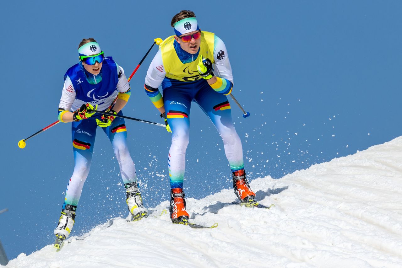 Germany's Linn Kazmaier competes in a cross-country race with her guide, Florian Baumann, on March 12. She won a gold, three silvers and a bronze in Beijing.