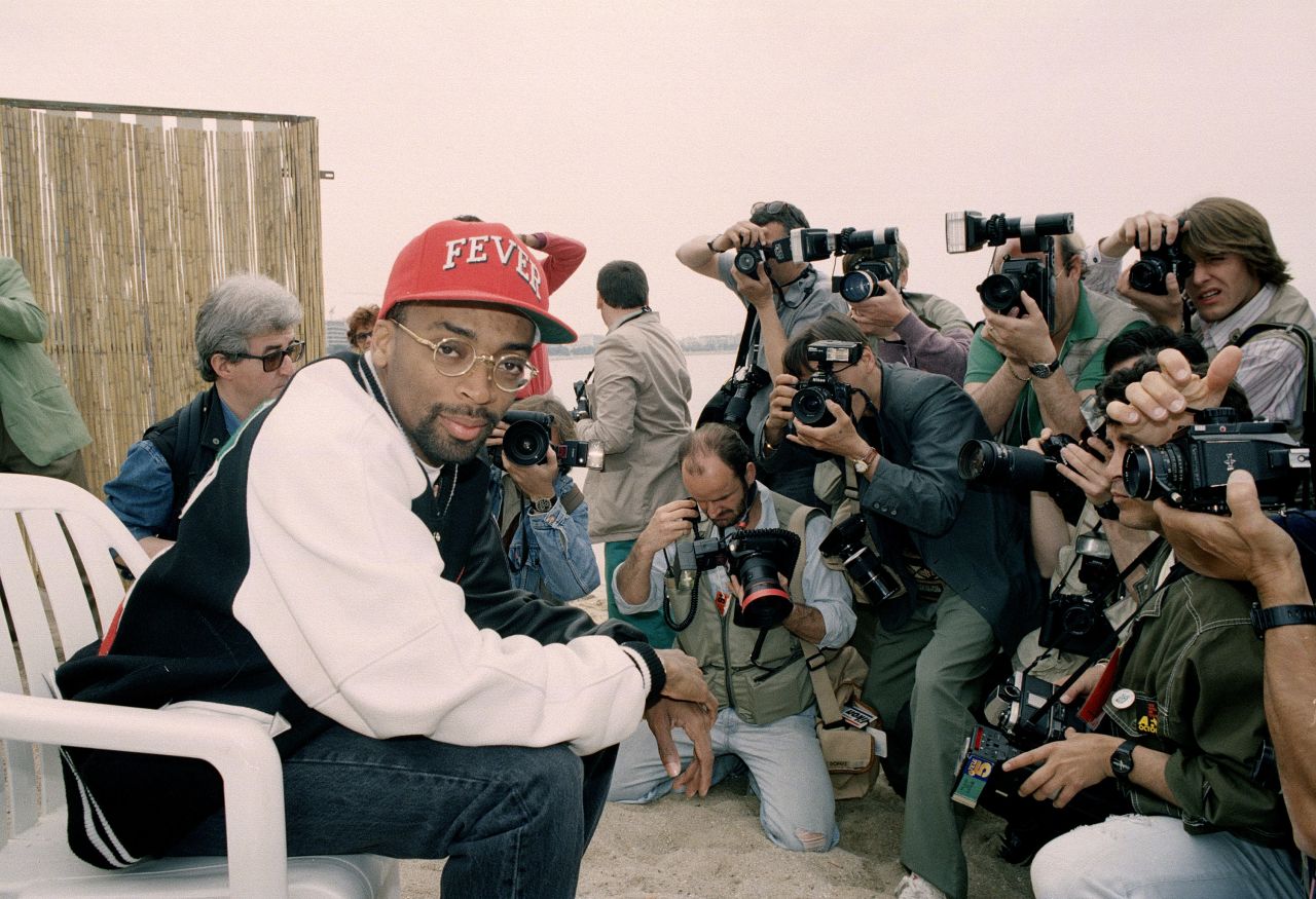Lee sits in front of photographers at the Cannes Film Festival in 1991. He presented his film "Jungle Fever" at the event.
