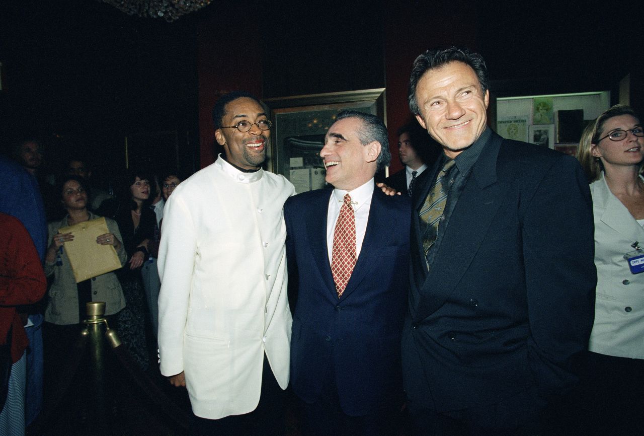 From left, Lee, director Martin Scorsese and actor Harvey Keitel appear at the premiere of Lee's film "Clockers" in 1995. Scorsese co-produced the movie.