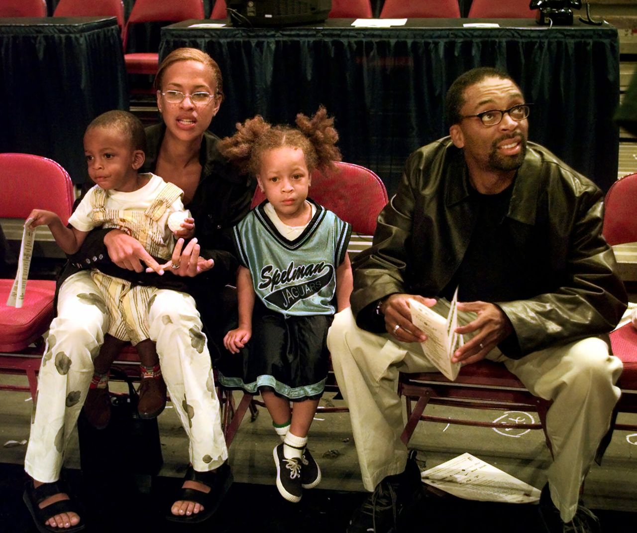 Lee sits with his wife, Tonya, and their children, Jackson and Satchel, on the sidelines of the WNBA All-Star Game in 1999.