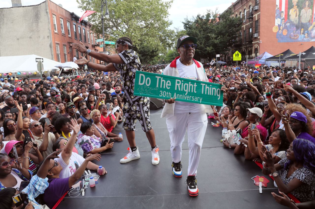 Lee and singer Maxwell attend a block party in Brooklyn, New York, for the 30th anniversary of "Do the Right Thing" in 2019.