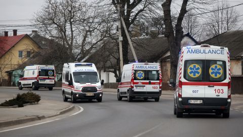 Ambulances are seen traveling to and from the Yavoriv military base on March 13, 2022.