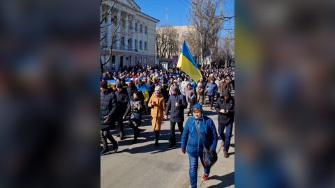 Residents of Russian-occupied Kherson protest on Sunday. 
