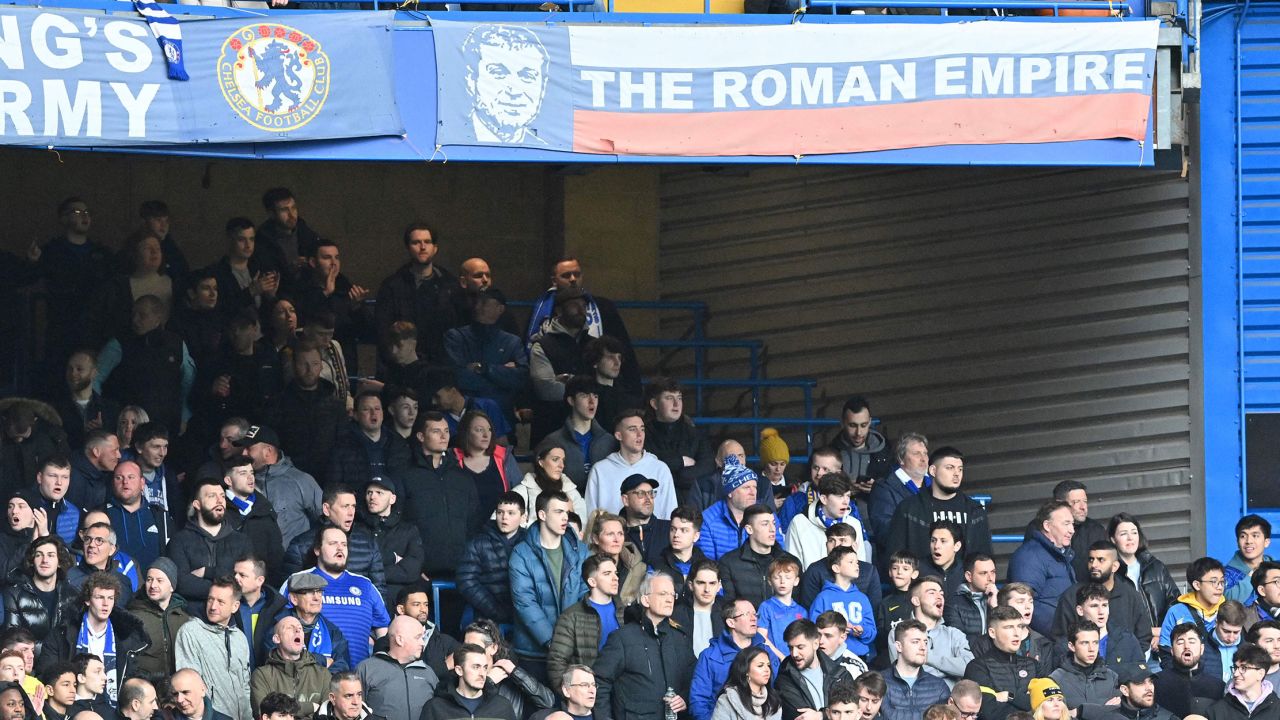 A banner in the colors of Russia's national flag, and depicting an image of Chelsea's Russian owner Roman Abramovich, is pictured in the stands on Sunday.