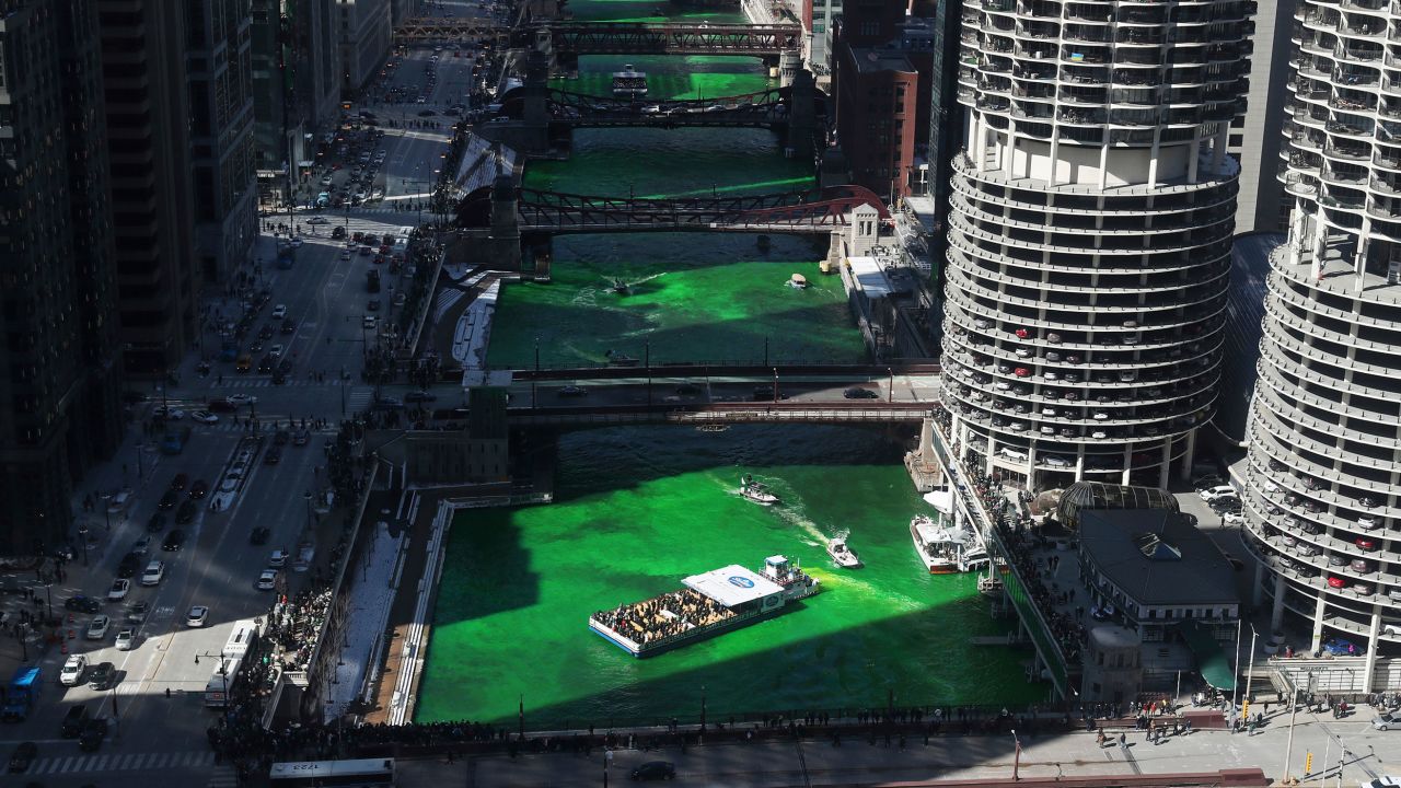 Workers began dyeing the Chicago River Saturday morning. 