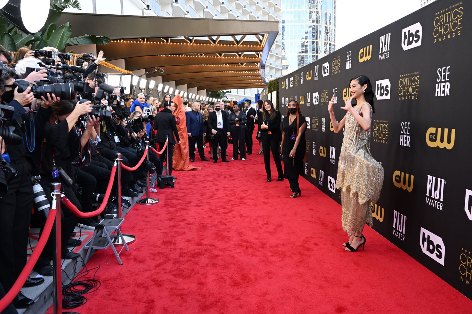 Actress Jung Ho-yeon waves to photographers.