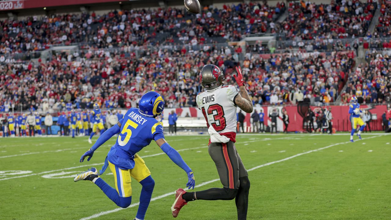 Bucs wide receiver Mike Evans catches what was thought to have been Tom Brady's last NFL touchdown throw ever -- until Brady came out of retirement on March 13.