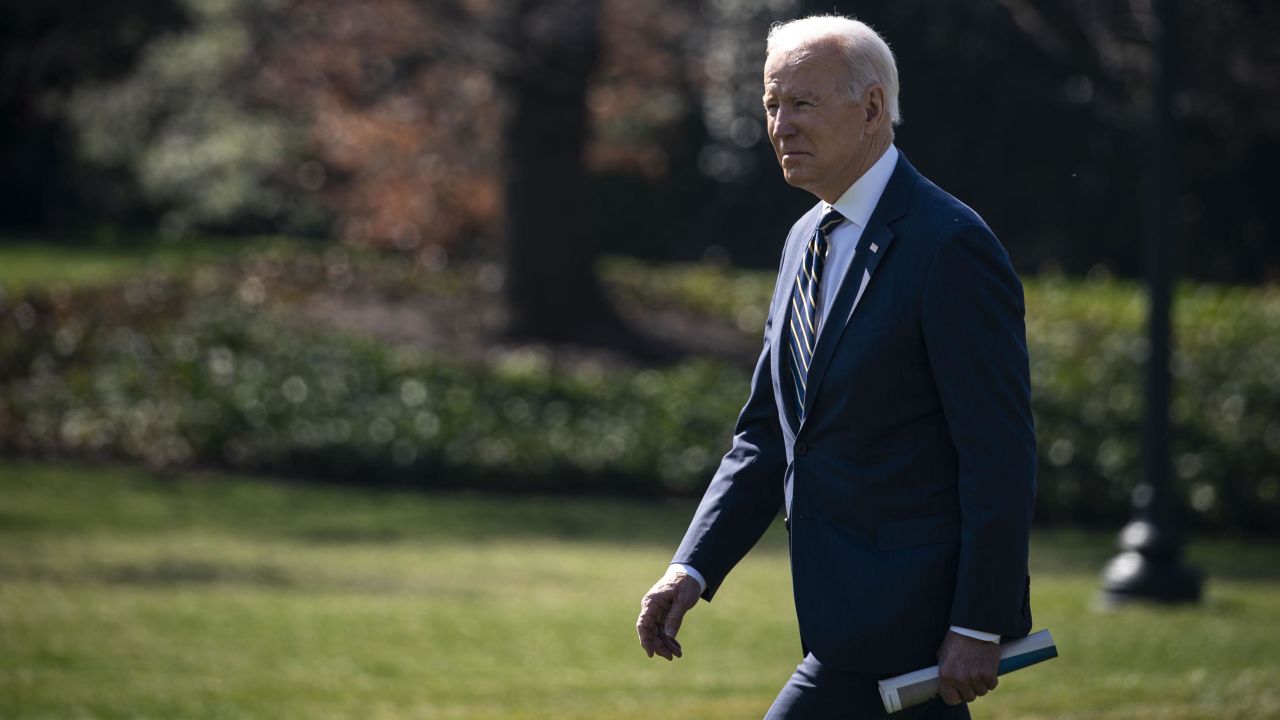 President Joe Biden walks on the South Lawn of the White House before boarding Marine One on Friday.