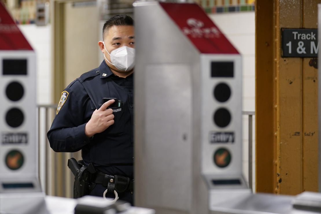 A law enforcement officer in New York is seen at a subway station on March 30, 2021, in the largely Asian American neighborhood of Flushing.