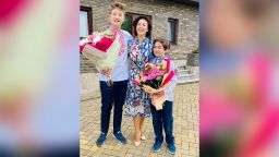 Yulia Gerbut and her two sons on September 1, 2021, on the first day of school in Ukraine.