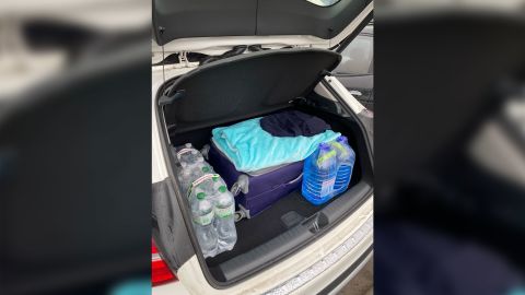 Yulia Gerbut packed one suitcase with clothing for her and her sons and placed it in the trunk of her car. She also packed food, water and snacks for the road.