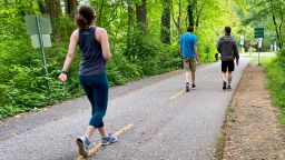 Joggers and walkers practice social distancing May 27, 2020 on Capital Crescent trail which connects Bethesda, Maryland to Washington D.C. 