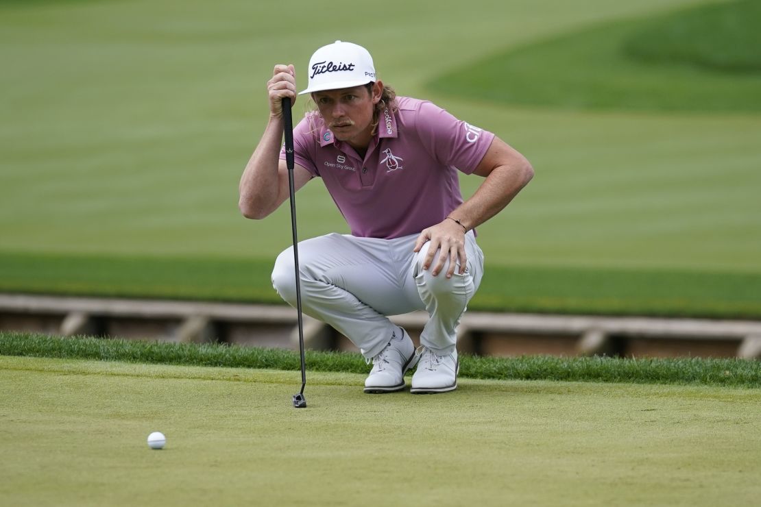 Smith lines up his putt on the fourth hole during the final round of the Players Championship.