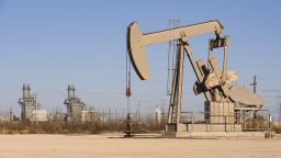A pumpjack operates just outside of the Odessa Ector Power Partners natural gas power plant Wednesday, March 9, 2022 in Odessa, Texas.  