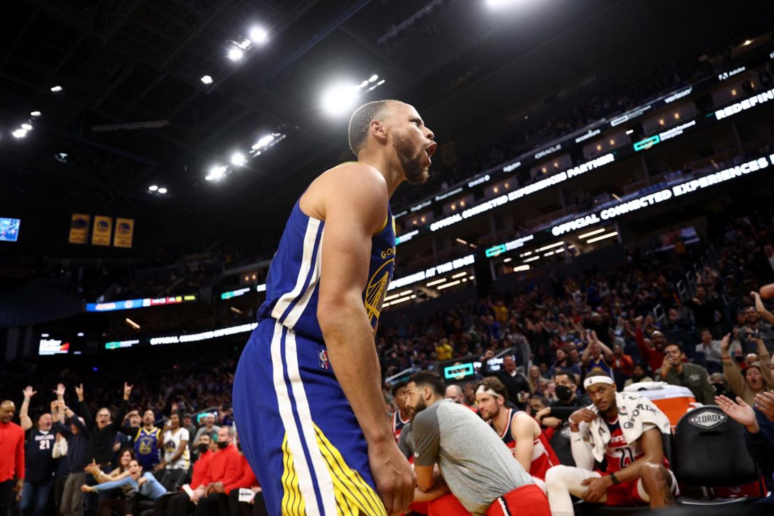 Curry reacts after making a basket and being fouled by the Wizards in the fourth quarter at Chase Center.