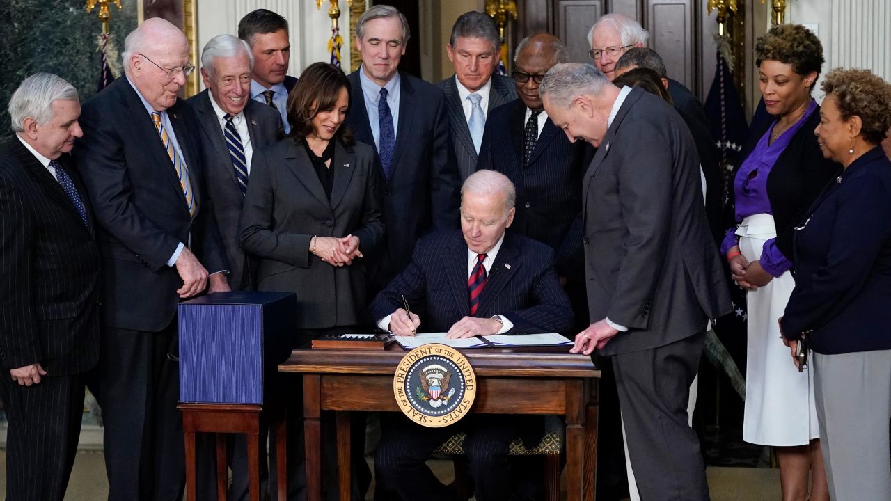 President Joe Biden signs the Consolidated Appropriations Act for Fiscal Year 2022 in the Indian Treaty Room in the Eisenhower Executive Office Building on the White House Campus in Washington, Tuesday, March 15, 2022. 