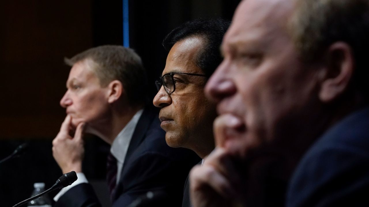 (L-R) FireEye CEO Kevin Mandia, SolarWinds CEO Sudhakar Ramakrishna and Microsoft President Brad Smith testify during a Senate Intelligence Committee hearing on Capitol Hill on February 23, 2021.