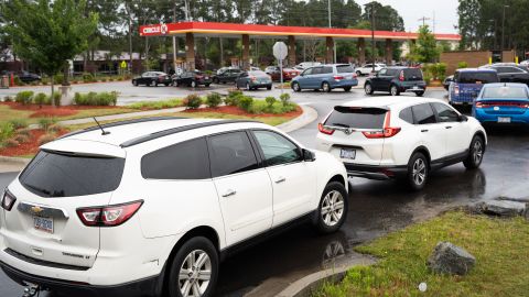 Motorists wait in line at a gas station on May 12, 2021 in Fayetteville, North Carolina, following the Colonial Pipeline hack.