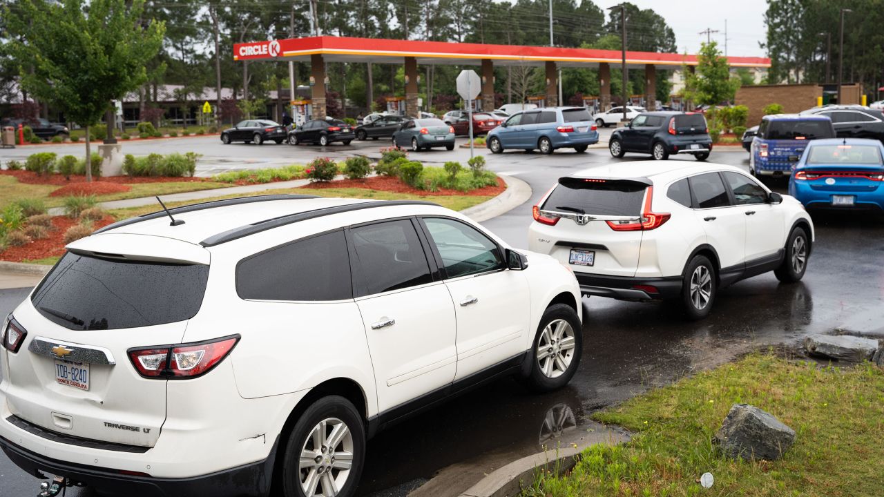 Motorists wait in line at a gas station on May 12, 2021 in Fayetteville, North Carolina, following the Colonial Pipeline hack. 