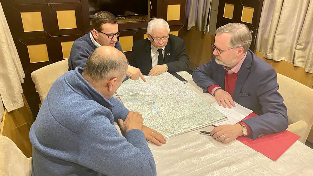 From Left: Slovenia's PM Janez Janša, Polish PM Mateusz Morawiecki, Polish deputy PM Jarosław Kaczyński, and Czech PM Petr Fiala study a map of Ukraine in an undisclosed location.
