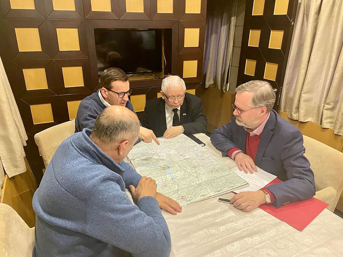 From Left: Slovenia's PM Janez Jan?a, Polish PM Mateusz Morawiecki, Polish deputy PM Jaros?aw Kaczyński, and Czech PM Petr Fiala study a map of Ukraine in an undisclosed location.