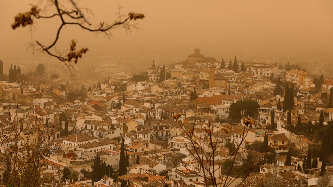 Hazy skies from the Saharan dust plume in Granada, Spain, on Tuesday. 