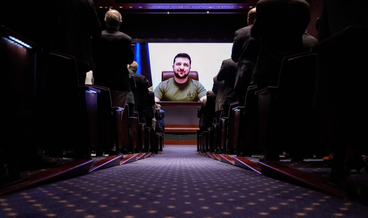 Ukrainian President Volodymyr Zelensky receives a standing ovation as he virtually addresses the US Congress on March 16. <a href=  Zelensky says Russia waging war so Putin can stay in power &#8216;until the end of his life&#8217; 220316094212 unf zelensky us congress address 0316
