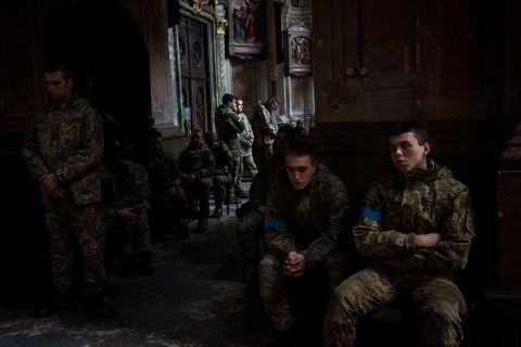 Military cadets attend a funeral ceremony at a church in Lviv on March 15. The funeral was for four of the Ukrainian servicemen who were killed during an airstrike on the Yavoriv military base near the Polish border. Local authorities say 35 people were killed.