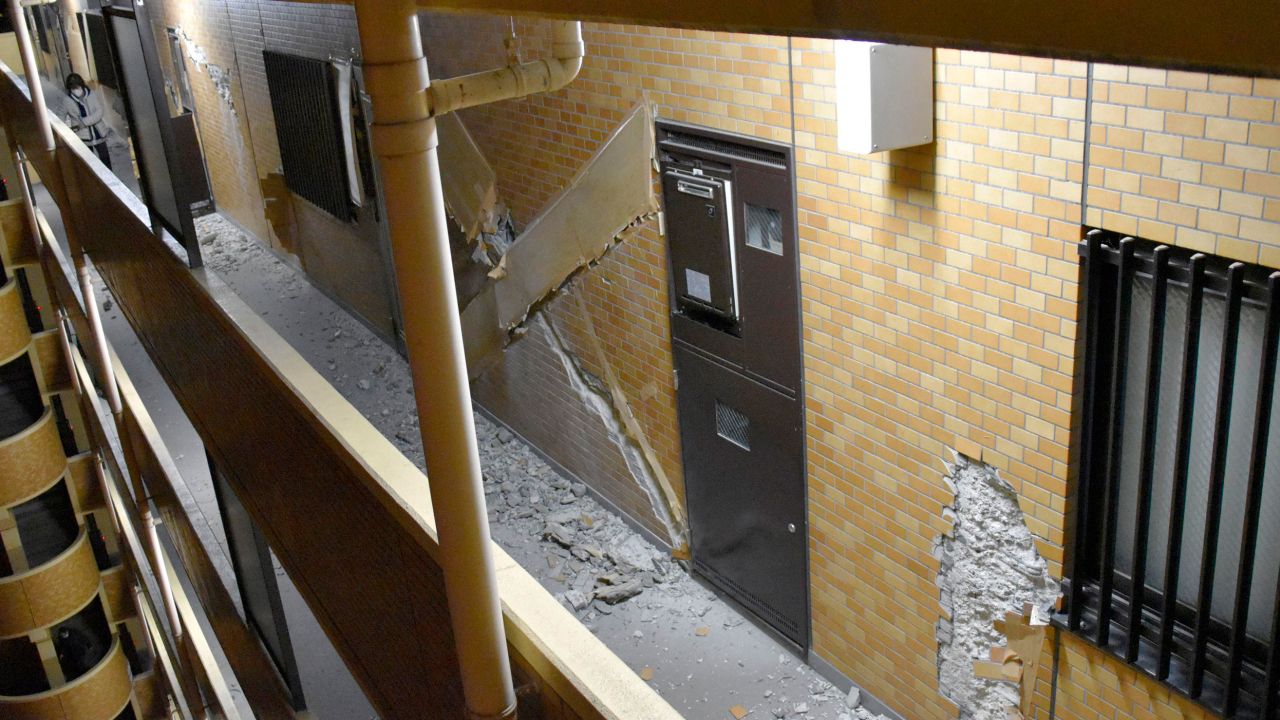 Cracked walls are seen at an apartment building in Fukushima after Wednesday's quake.