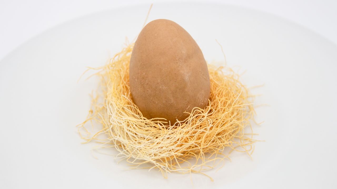 <strong>Egg dessert:</strong> This egg isn't all it's cracked up to be. In fact it's an elaborate dessert. An almond icing shell contains a sesame and apricot center.