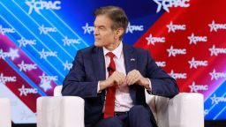 Mehmet Oz, celebrity physician and U.S. Republican Senate candidate for Pennsylvania, right, listens during the Conservative Political Action Conference (CPAC) in Orlando, Florida, U.S., on Sunday, Feb. 27, 2022. Launched in 1974, the Conservative Political Action Conference is the largest gathering of conservatives in the world. Photographer: Tristan Wheelock/Bloomberg via Getty Images