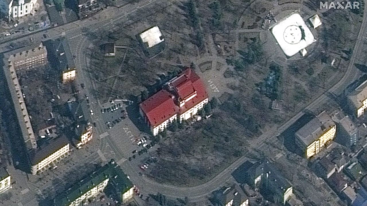 The Russian word ДЕТИ, or "Children" is seen on the grounds of the Mariupol theater prior to being bombed.