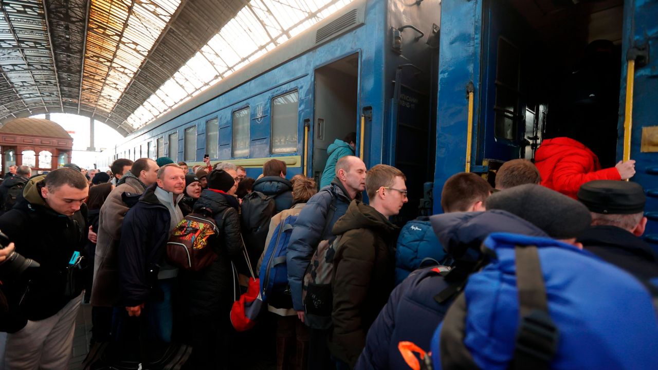 Passengers board a train in Lviv, Ukraine, on March 15.