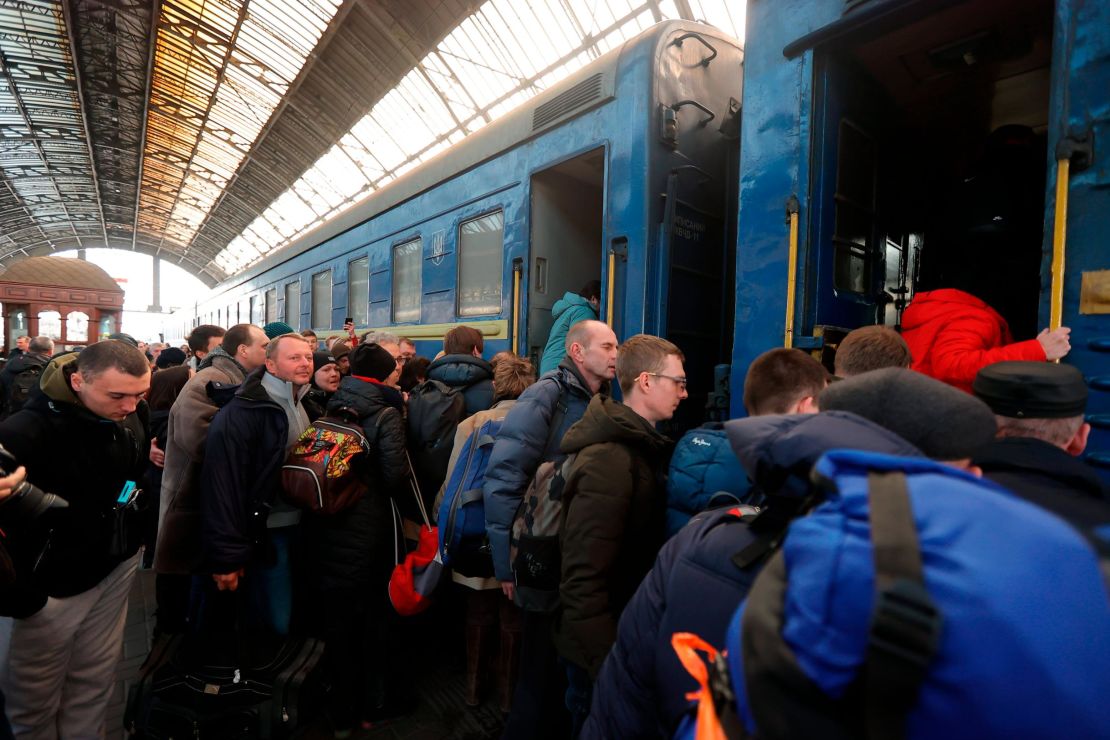 Passengers board a train in Lviv, Ukraine, on March 15.