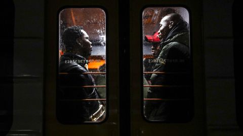 People arrive on a train from Ukraine at the main railway station in Przemysl, Poland, on February 27, as the Russian invasion on Ukraine caused a mass exodus of refugees.