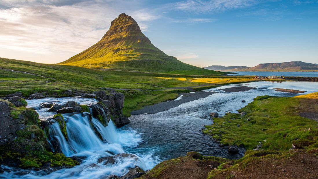 <strong>3. Iceland.</strong> Iceland, with Kirkjufell pictured in the background, rates highly along with its Nordic neighbors in areas such as life expectancy, GDP per capita, social support, low corruption and high social trust, generosity and freedom.