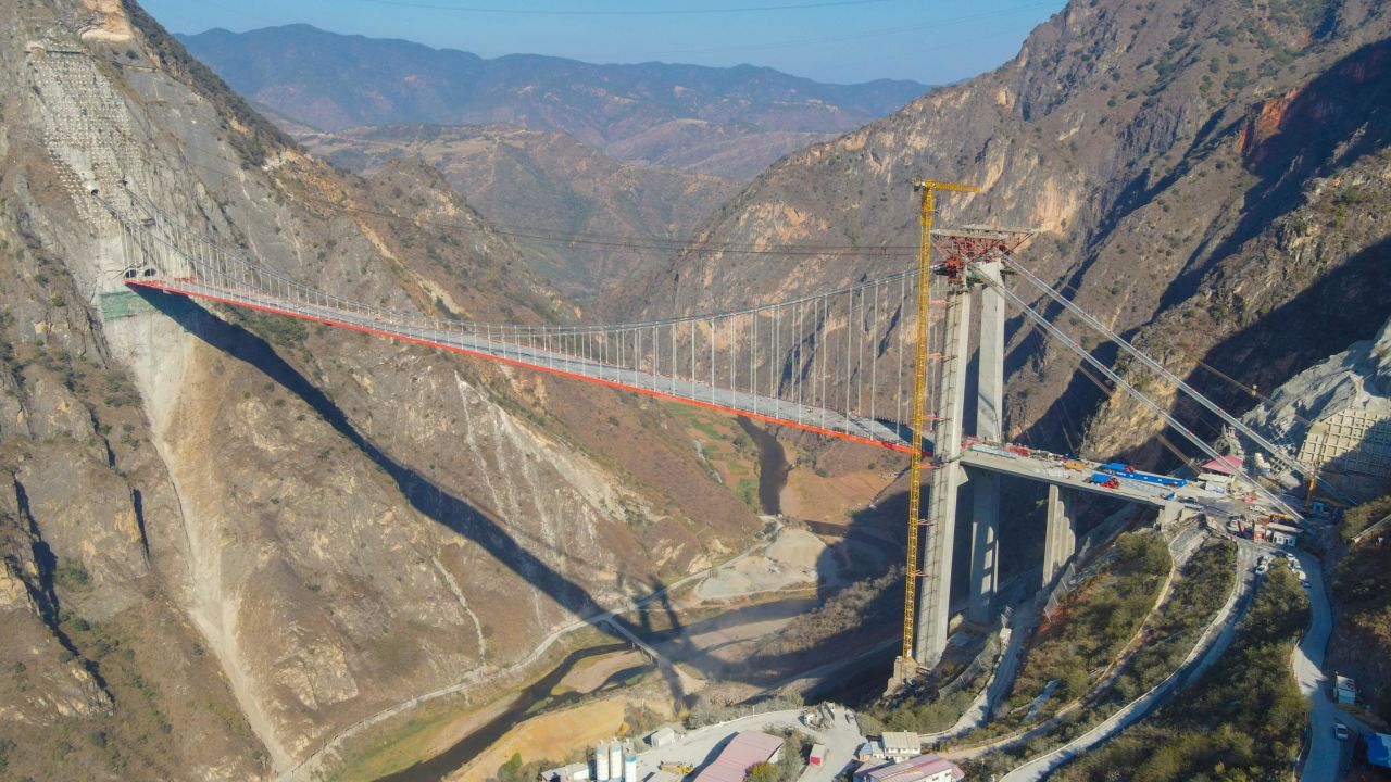 Aerial view of the construction site of Lvzhijiang Bridge, the world's largest single-tower, single-span suspension bridge, on March 8, 2022 in Yuxi, Yunnan province.