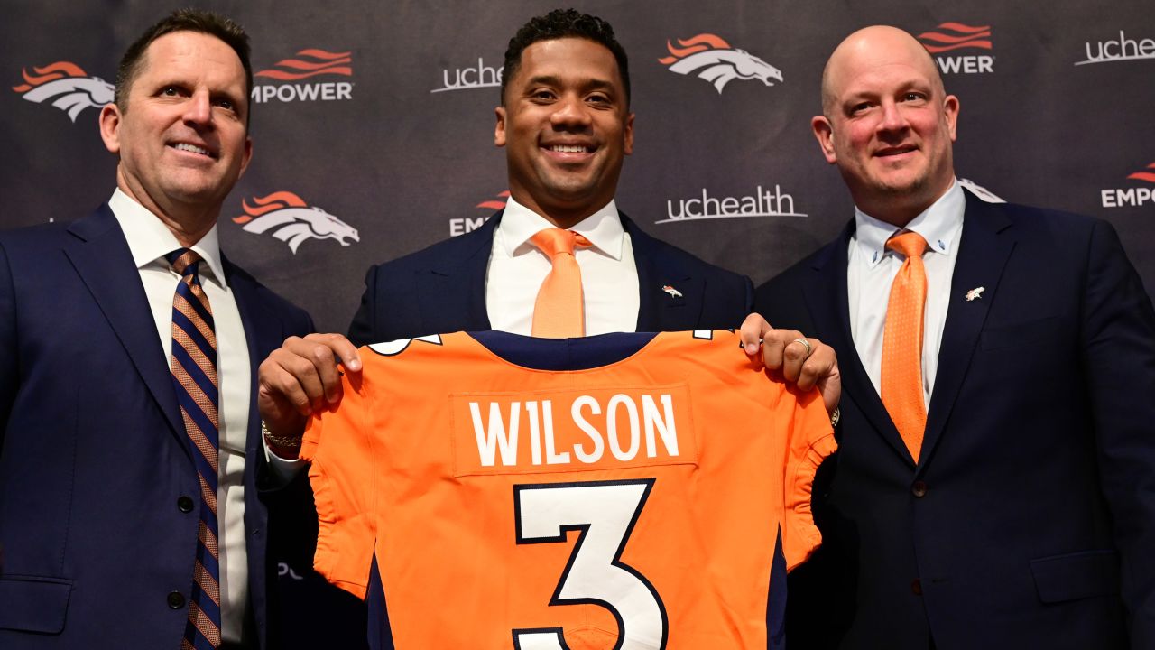 Russell Wilson is introduced alongside Broncos head coach Nathaniel Hackett and general manager George Paton.