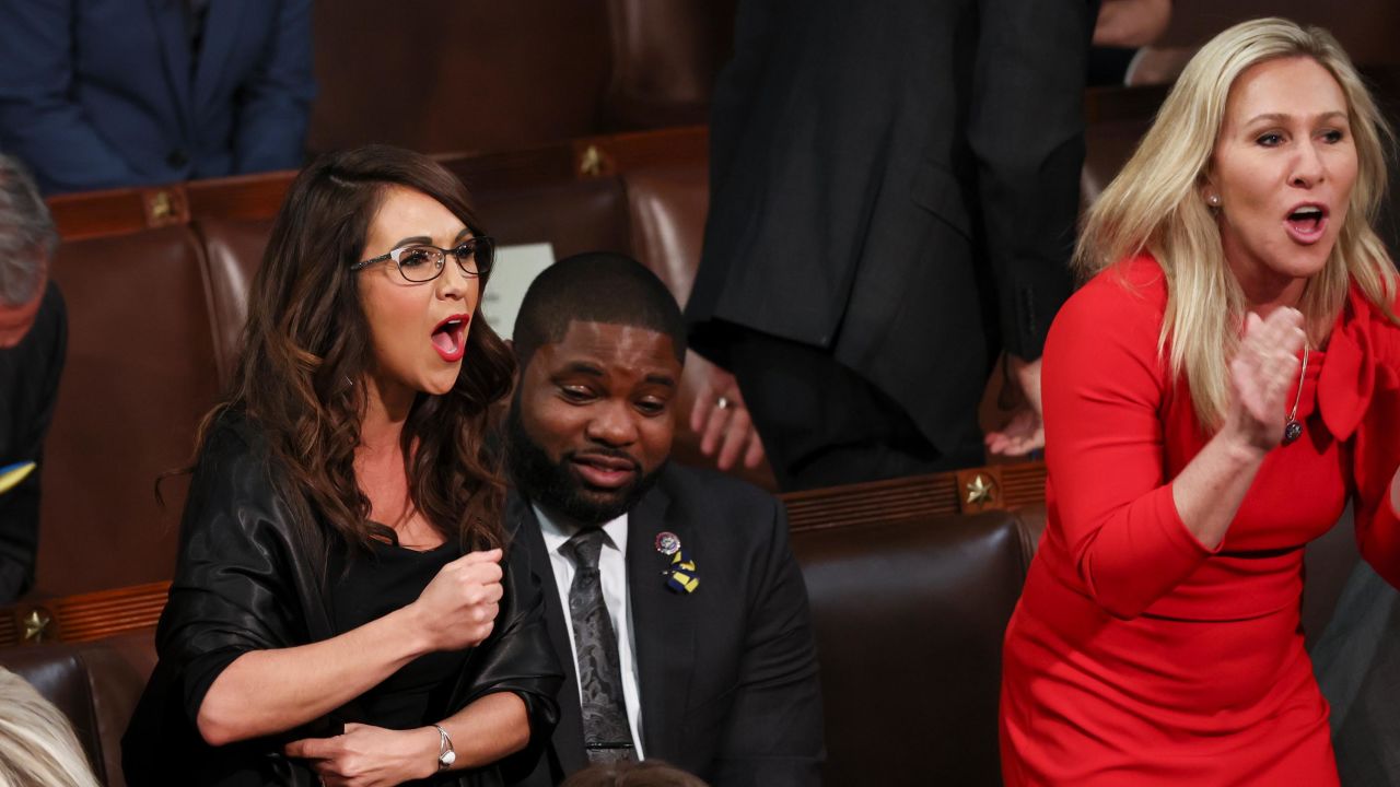 U.S. Rep. Lauren Boebert (R-CO) and Rep. Marjorie Taylor Greene (R-GA) scream "Build the Wall" as U.S. President Joe Biden delivers the State of the Union address during a joint session of Congress in the U.S. Capitol's House Chamber March 01, 2022 in Washington, DC.