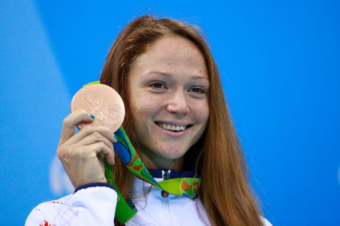 Aliaksandra Herasimenia shows off her bronze on the podium during the medal ceremony for the women's 50m freestyle final on Day 8 of the Rio 2016 Olympic Games at the Olympic Aquatics Stadium on August 13, 2016 in Rio de Janeiro, Brazil.