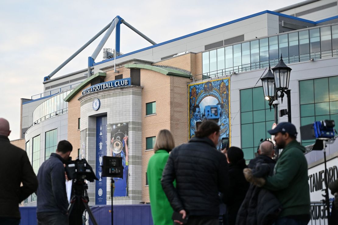 Members of the media work outside Chelsea's Stamford Bridge stadium in London on March 10, 2022.